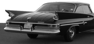 A tail end view of a 1961 Chrysler 300 G