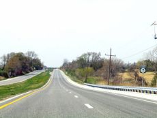 Image of an empty country road.