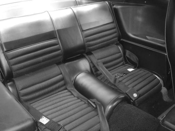 View of unfolded rear seat in a 1969 or 1970 Ford Mustang